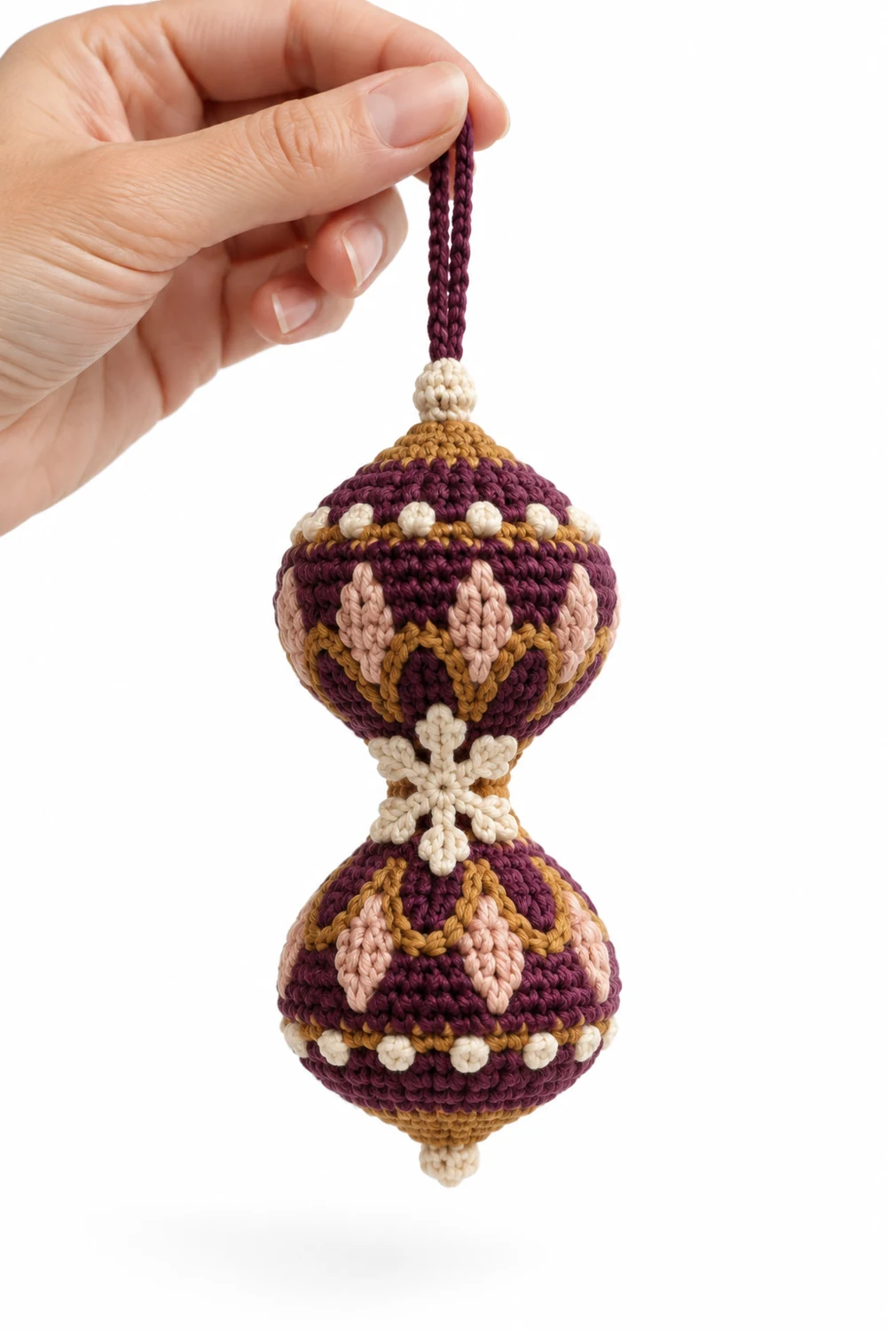 Aubergine crochet hourglass ornament with snowflake waist