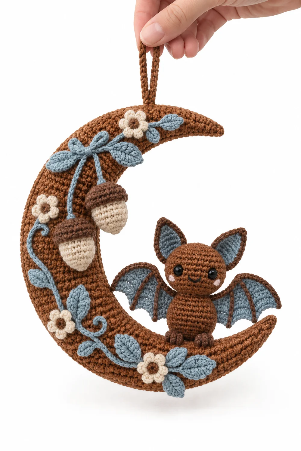 Cinnamon crochet wall hanging with bat and crescent moon