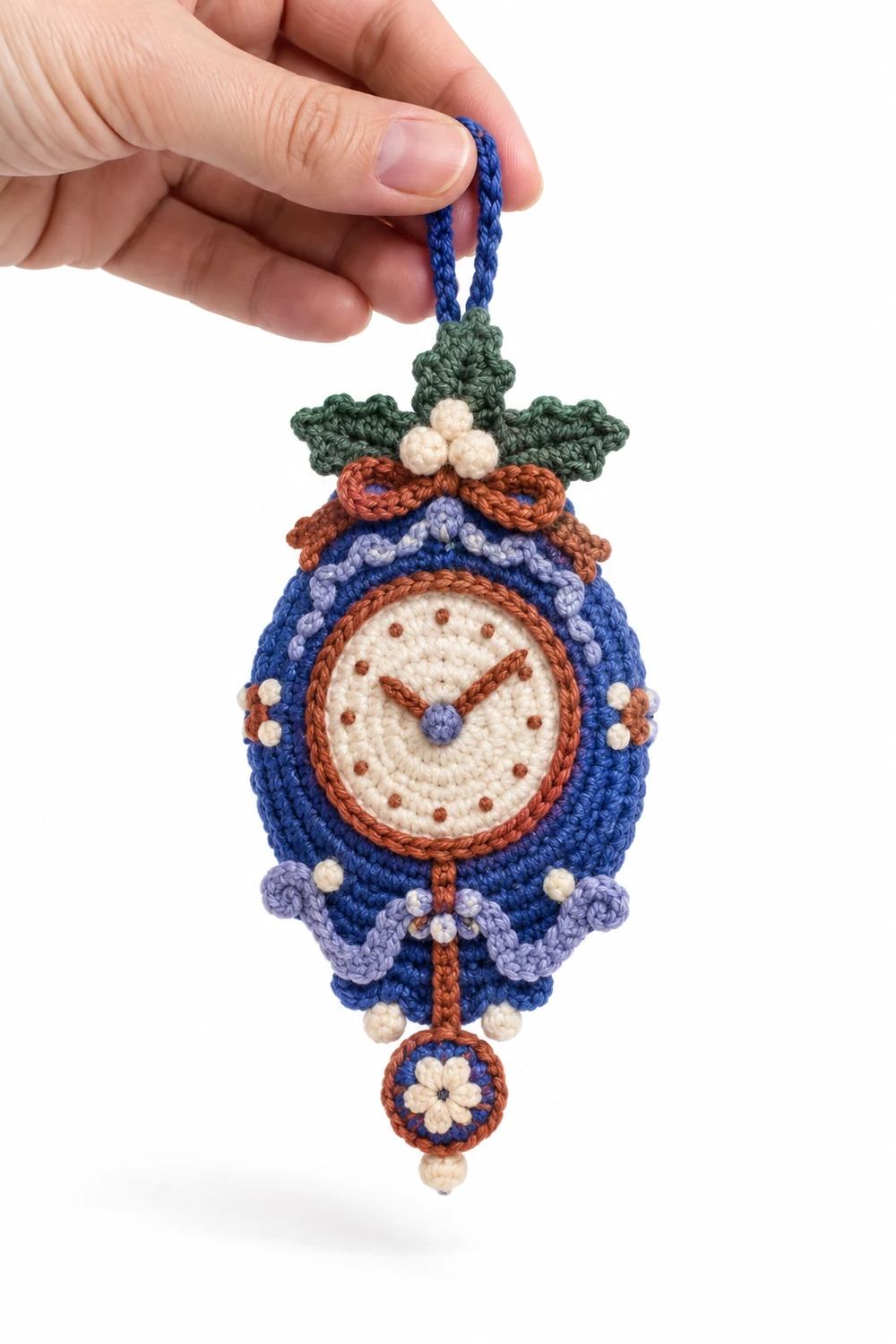 Cobalt crochet pendulum clock ornament with holly crown