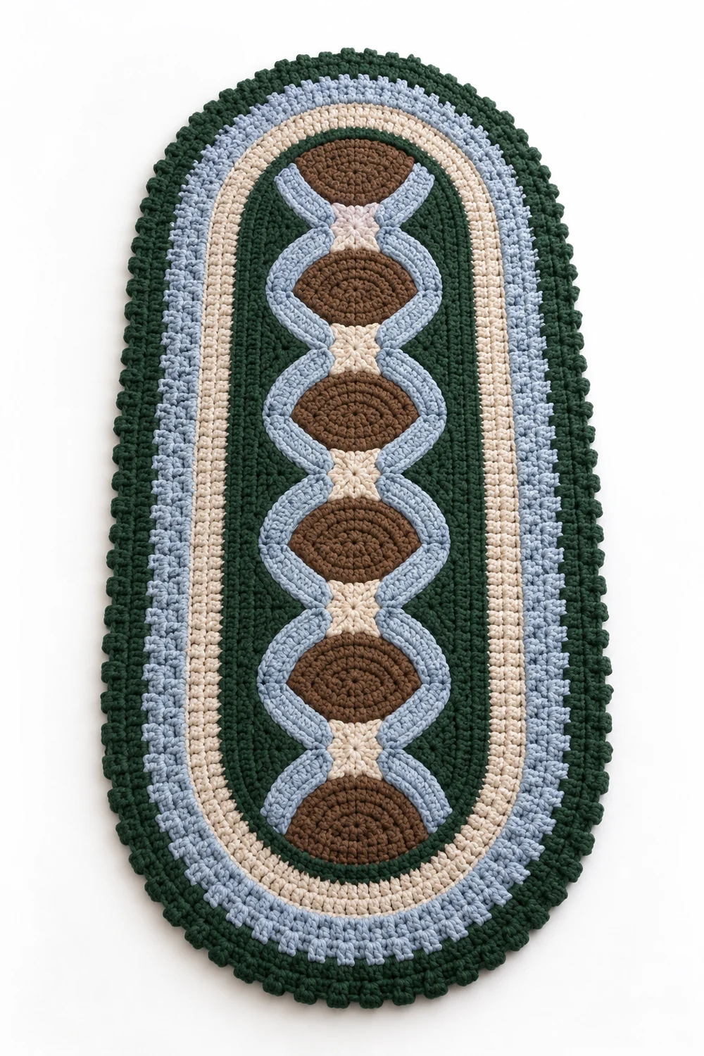 Forest green capsule crochet rug with cobblestone mosaic and stepped border