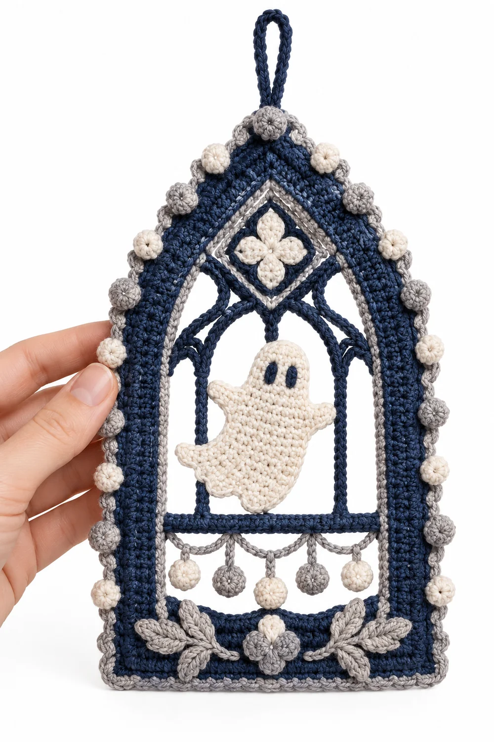 Ink blue crochet haunted window decoration with bubble border