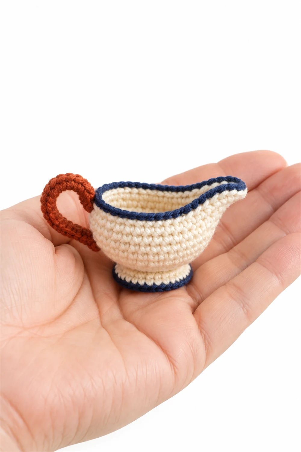 Miniature cream crochet gravy boat with spout and handle