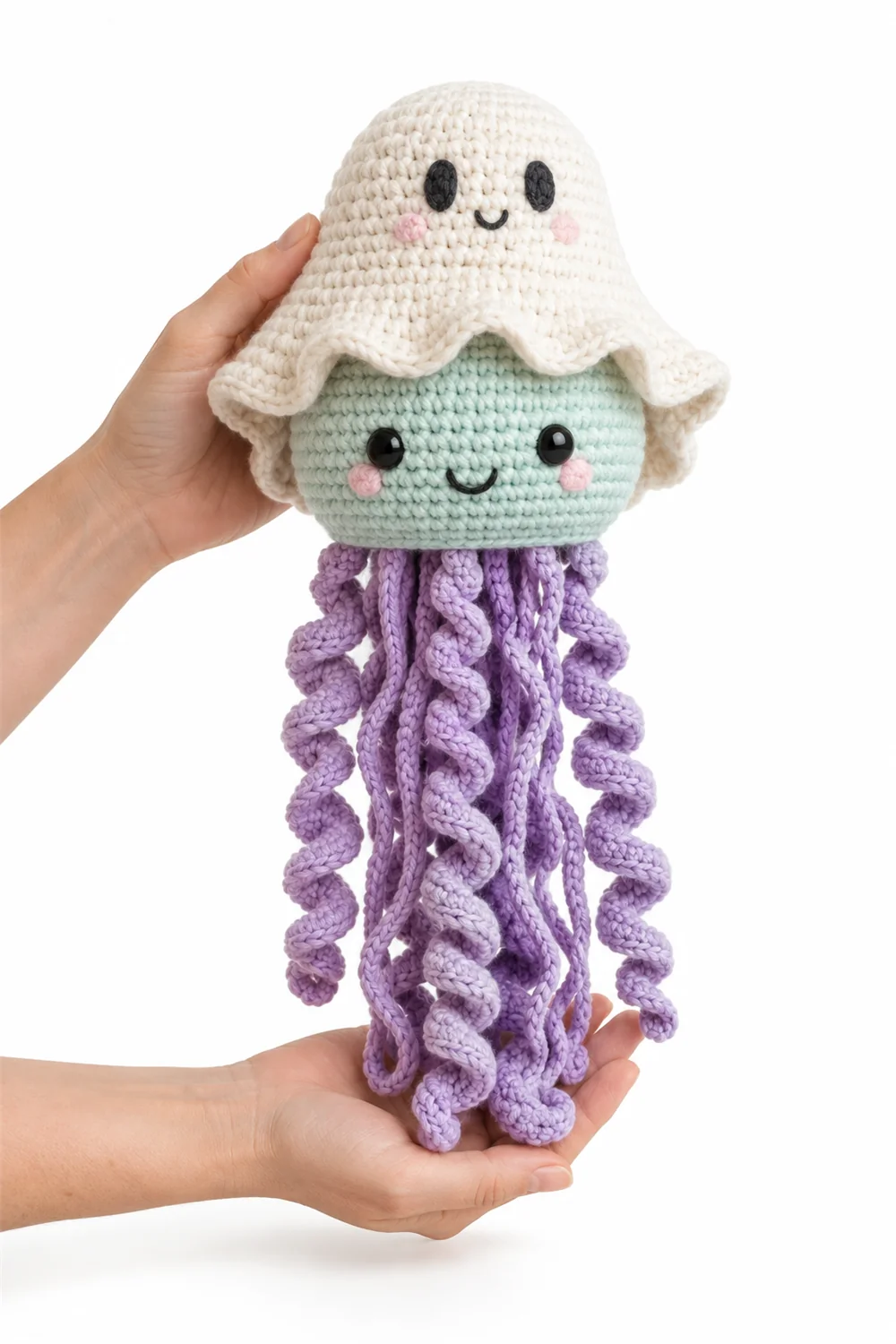 Pale mint crochet ghost jellyfish with flowing tentacles