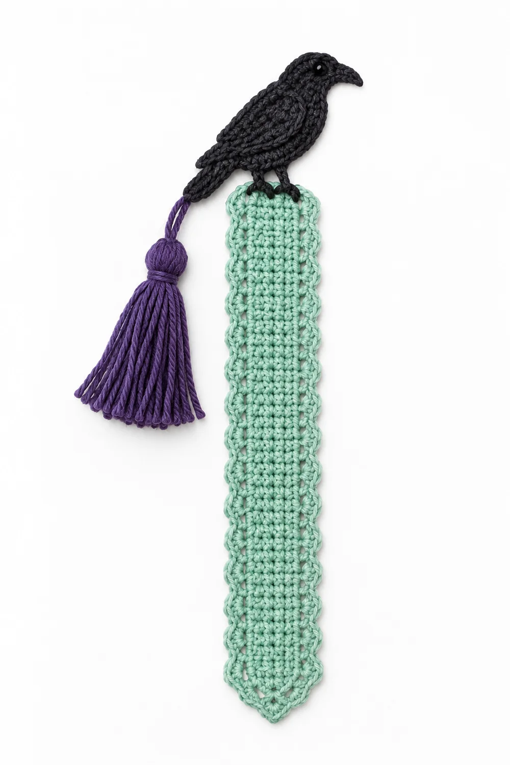Mint green crochet raven bookmark for Halloween reading