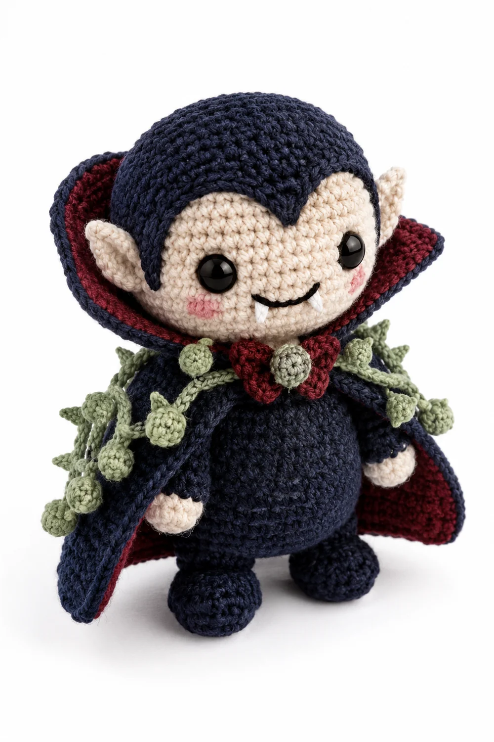 Navy blue crochet vampire figure with chestnut shell details