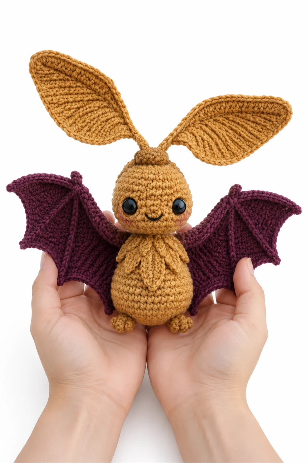 Ochre crochet bat with maple seed wing shapes for Halloween