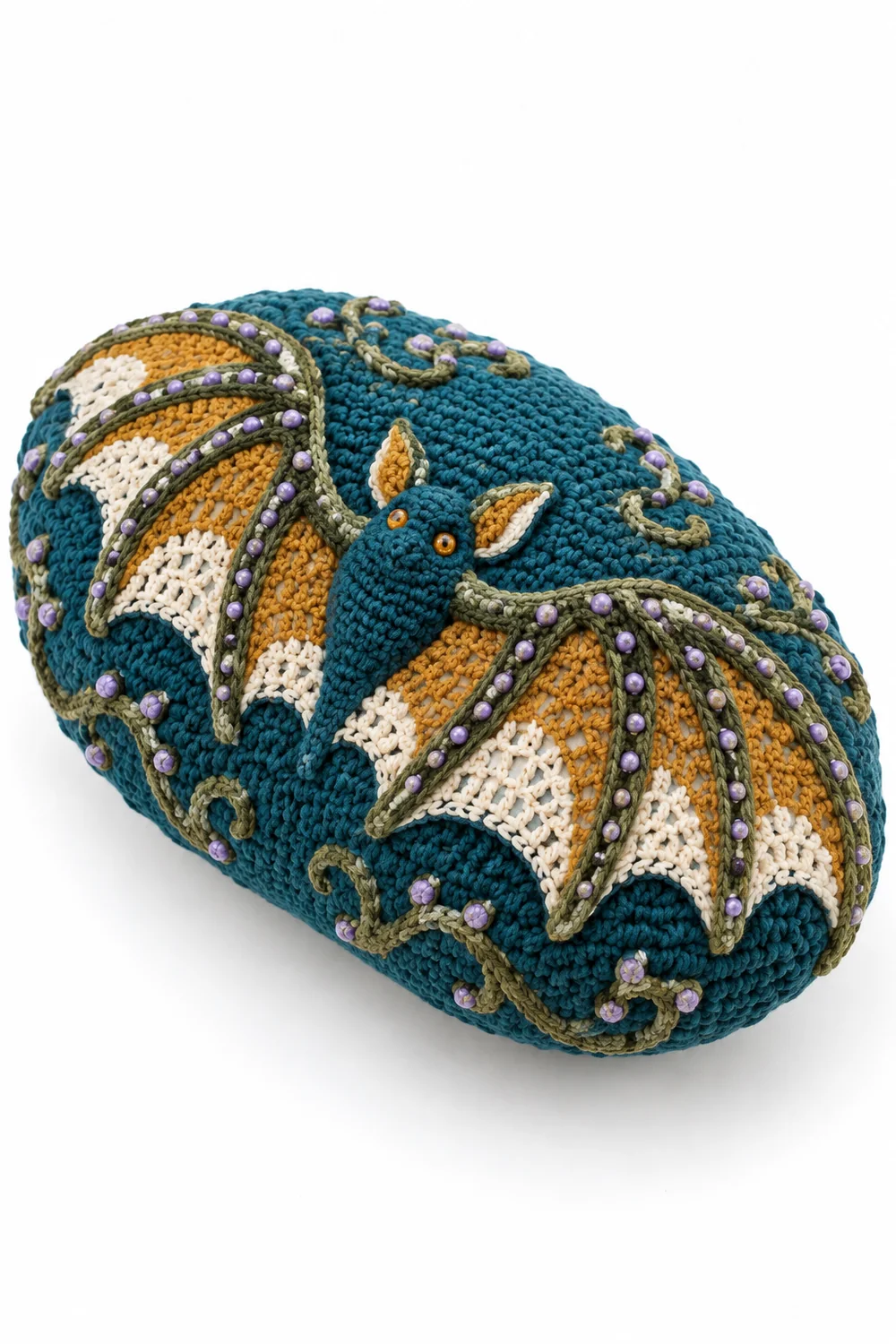 Petrol teal crochet bat wing cushion with seed beadwork