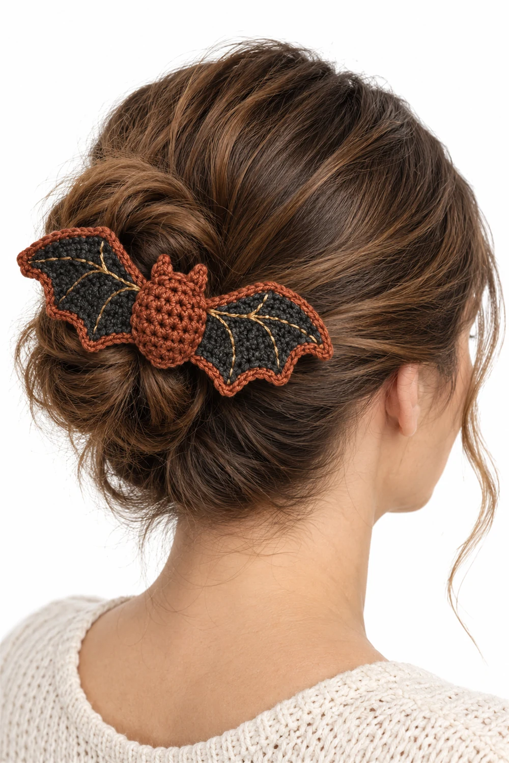 Rust crochet hair clip with bat-wing leaves and berries
