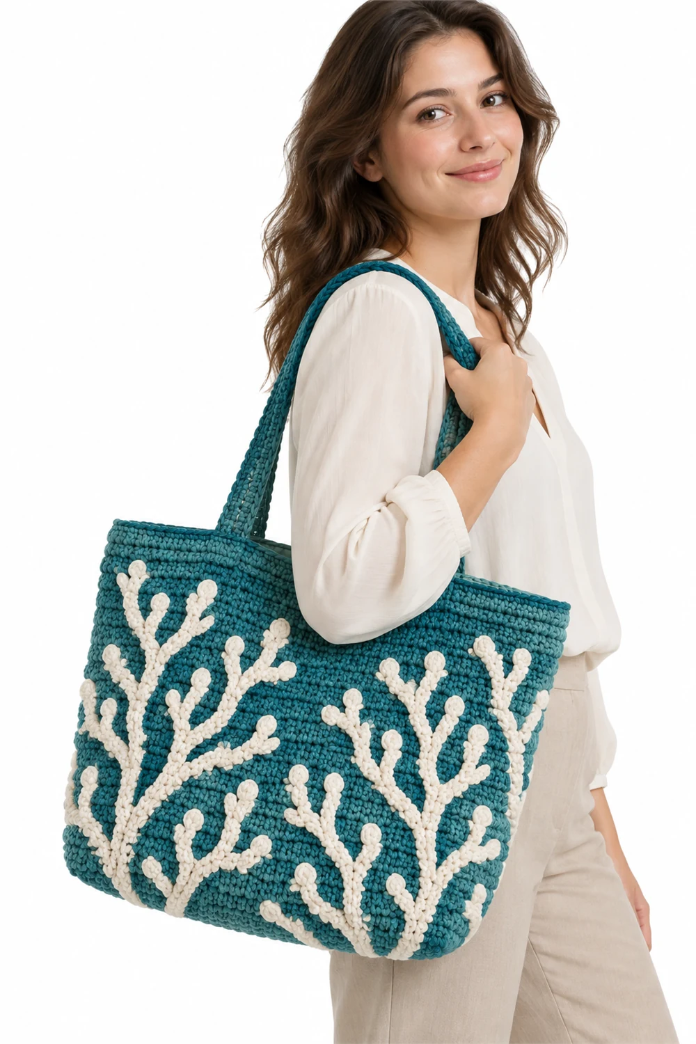 Teal crochet tote bag with coral lace openwork texture